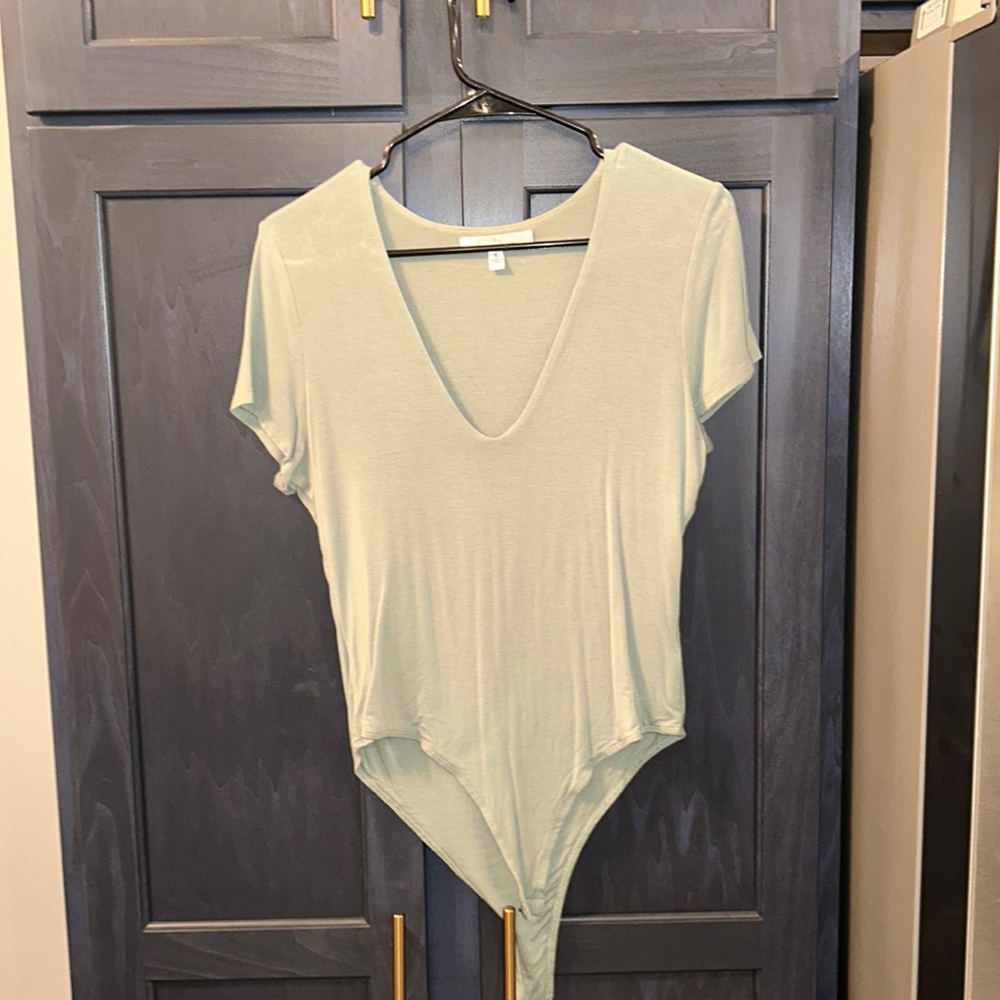 Womens XL green bodysuit. Worn once.